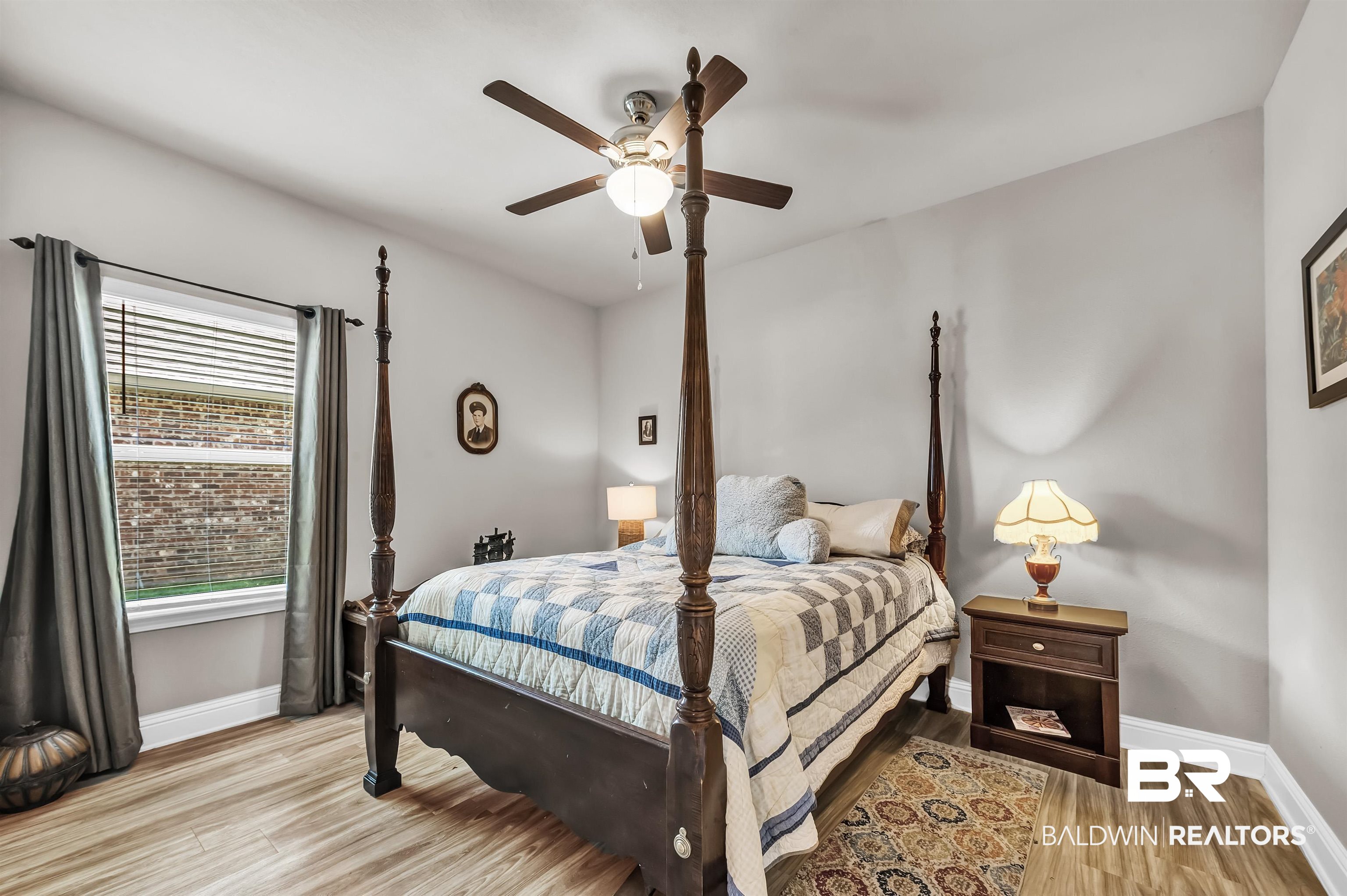 24655 Slater Mill Road Daphne, AL 36526 - Photo 24 of 36 Bedroom with baseboards, light wood-style flooring, and a ceiling fan