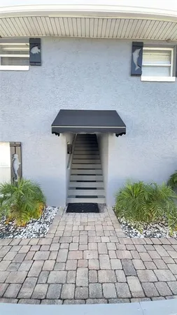 a view of a backyard of the house