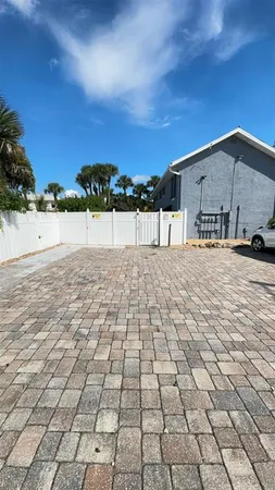a view of a backyard of the house