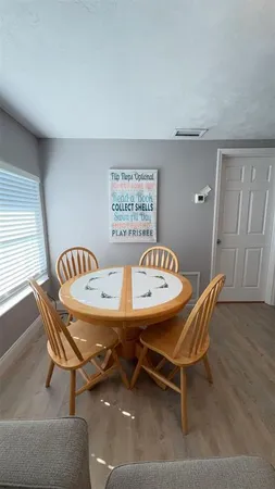 a view of a table and chairs in a room