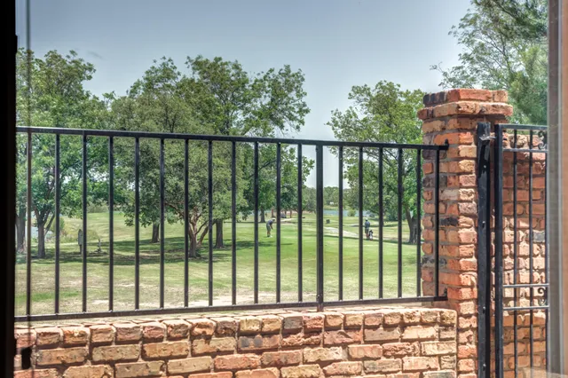 a living room with a flat screen tv and a fireplace