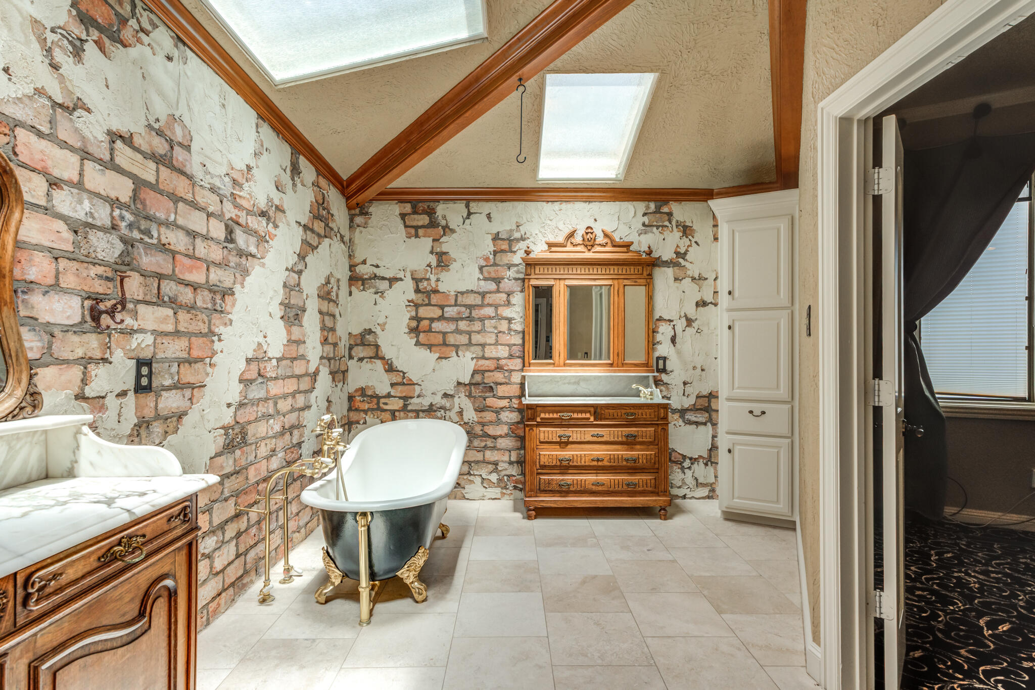 8901 York Place Lubbock, TX 79424 - Photo 27 of 45 a bathroom with a sink a toilet and shower