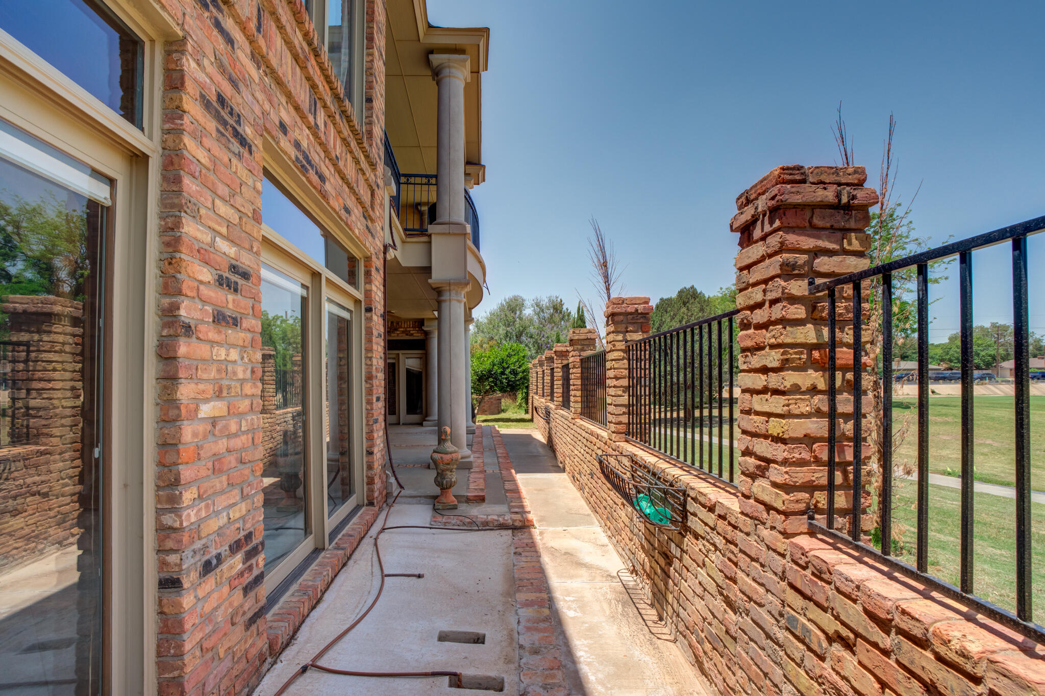 8901 York Place Lubbock, TX 79424 - Photo 41 of 45 a view of a brick house with a large window