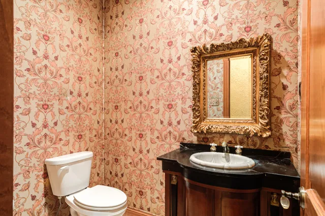 a bathroom with a sink and a toilet