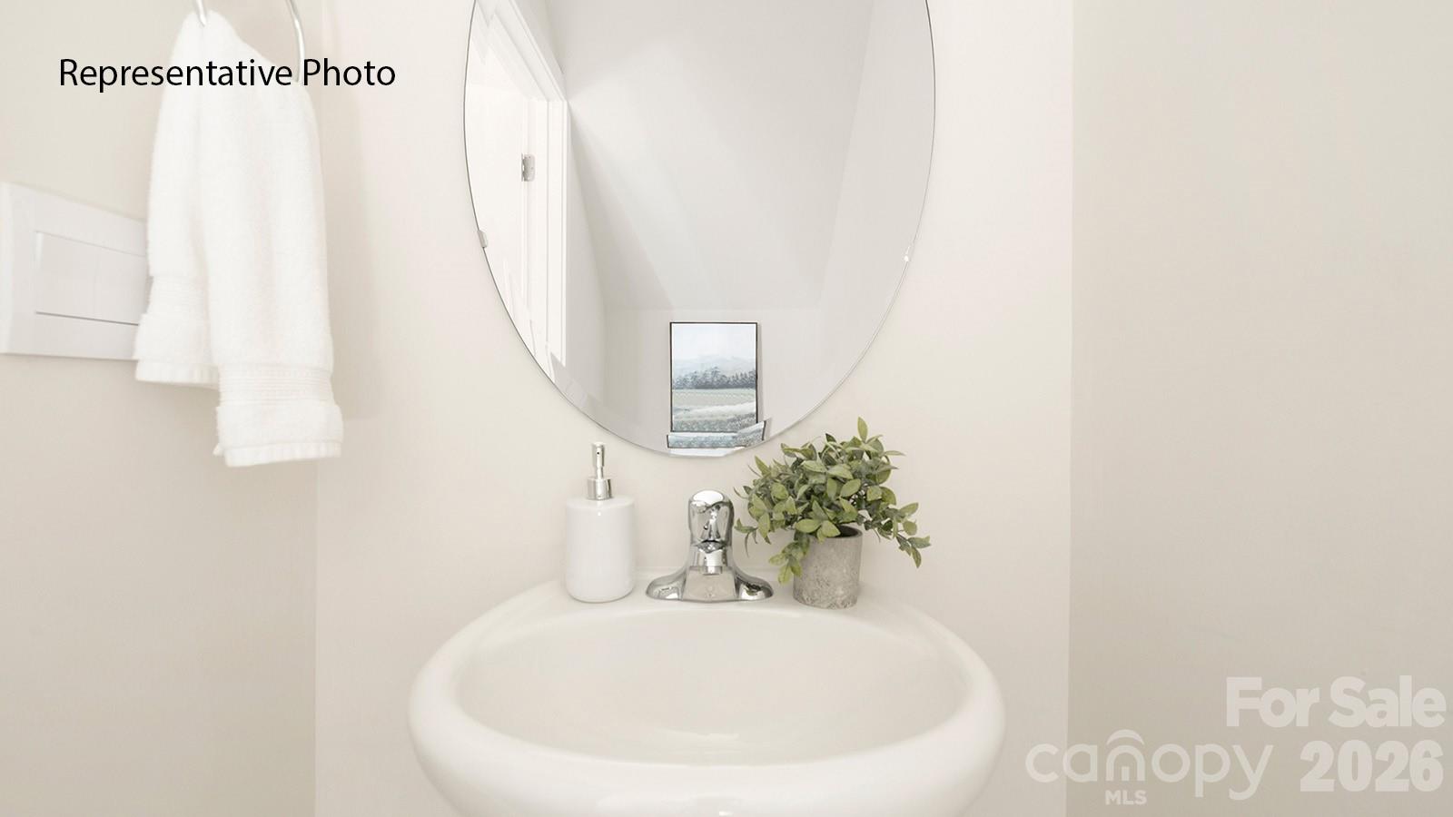 1018 Two Brothers Lane York, SC 29745 - Photo 10 of 21 a white bath tub sitting next to a white sink