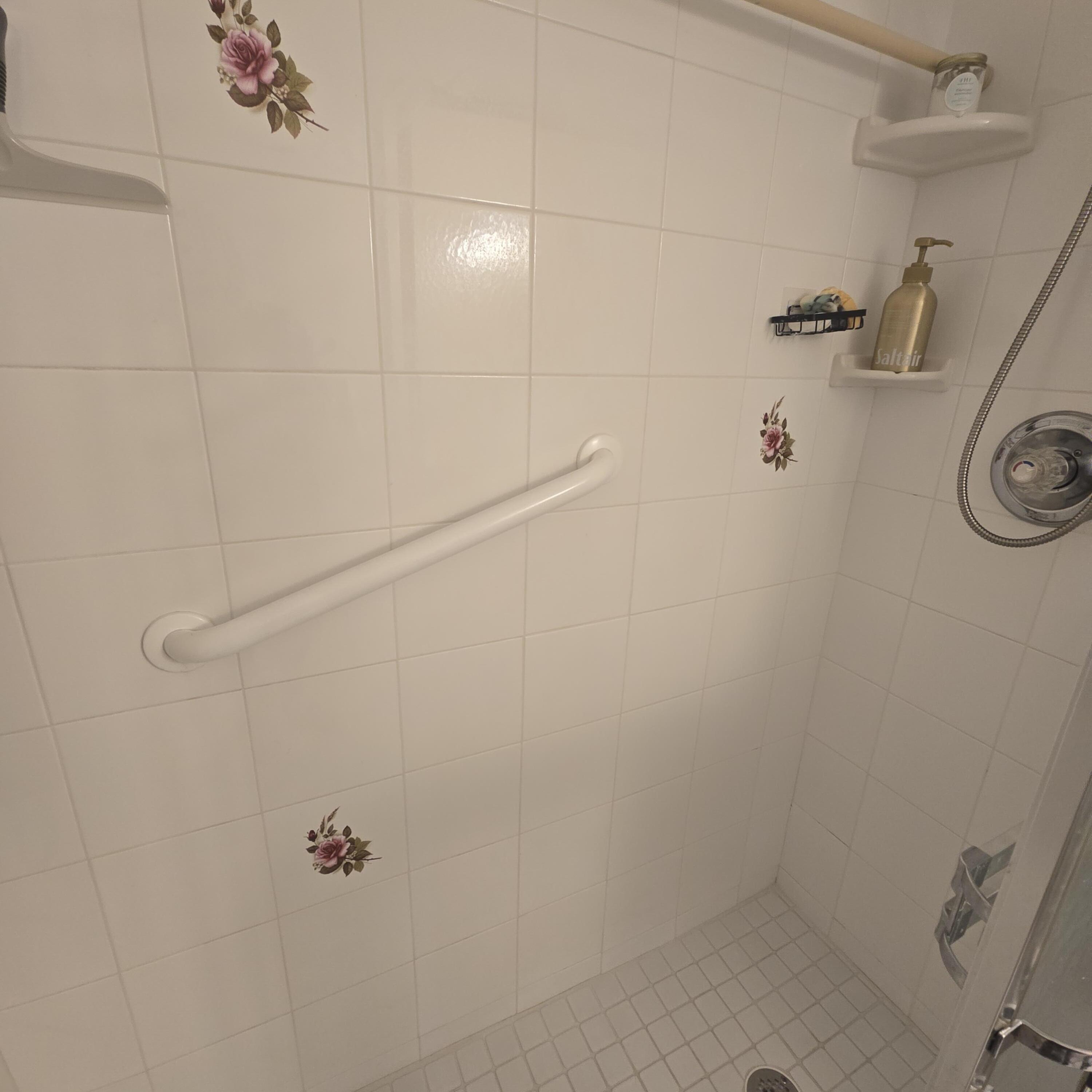 1967 Southwest Palm City Road, Unit 34C Stuart, FL 34994 - Photo 14 of 25 a bathroom with a shower