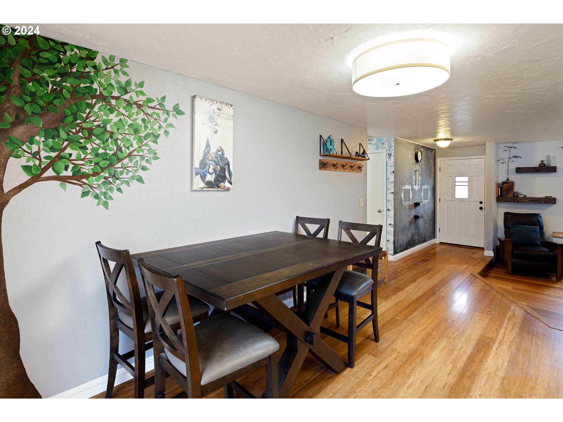 6926 B Street Springfield, OR 97478 - Photo 11 of 29 a view of a dining room with furniture and wooden floor