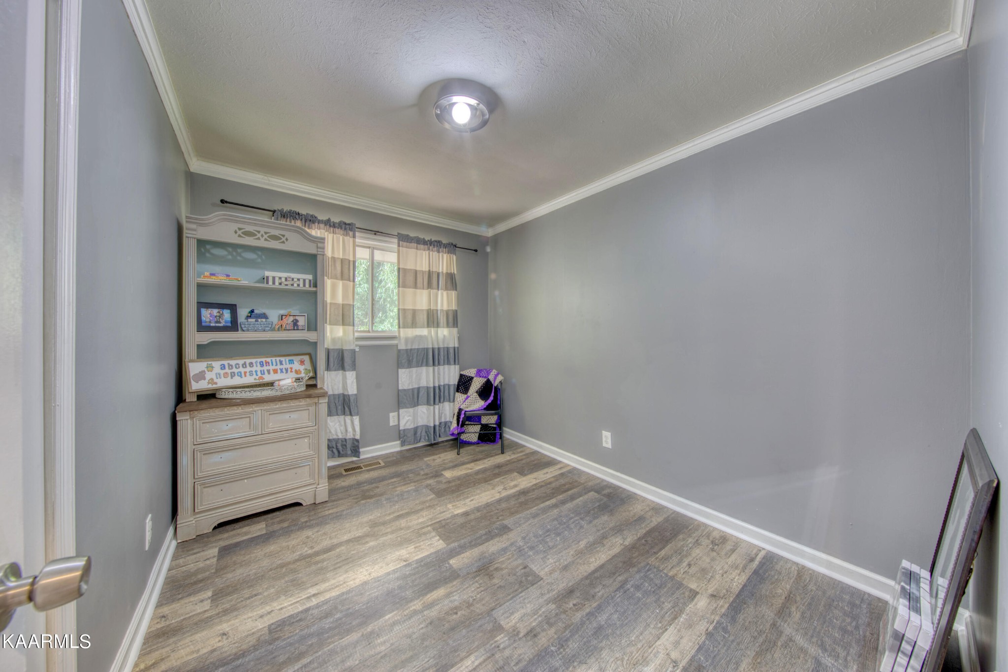 100 Windham Road Oak Ridge, TN 37830 - Photo 6 of 27 a view of an empty room and a window