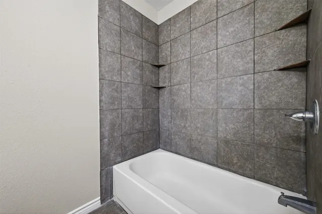 a bathroom with a bathtub