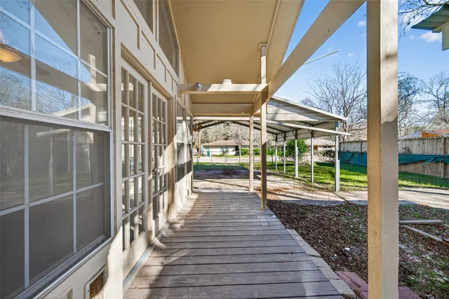 a view of a balcony with door
