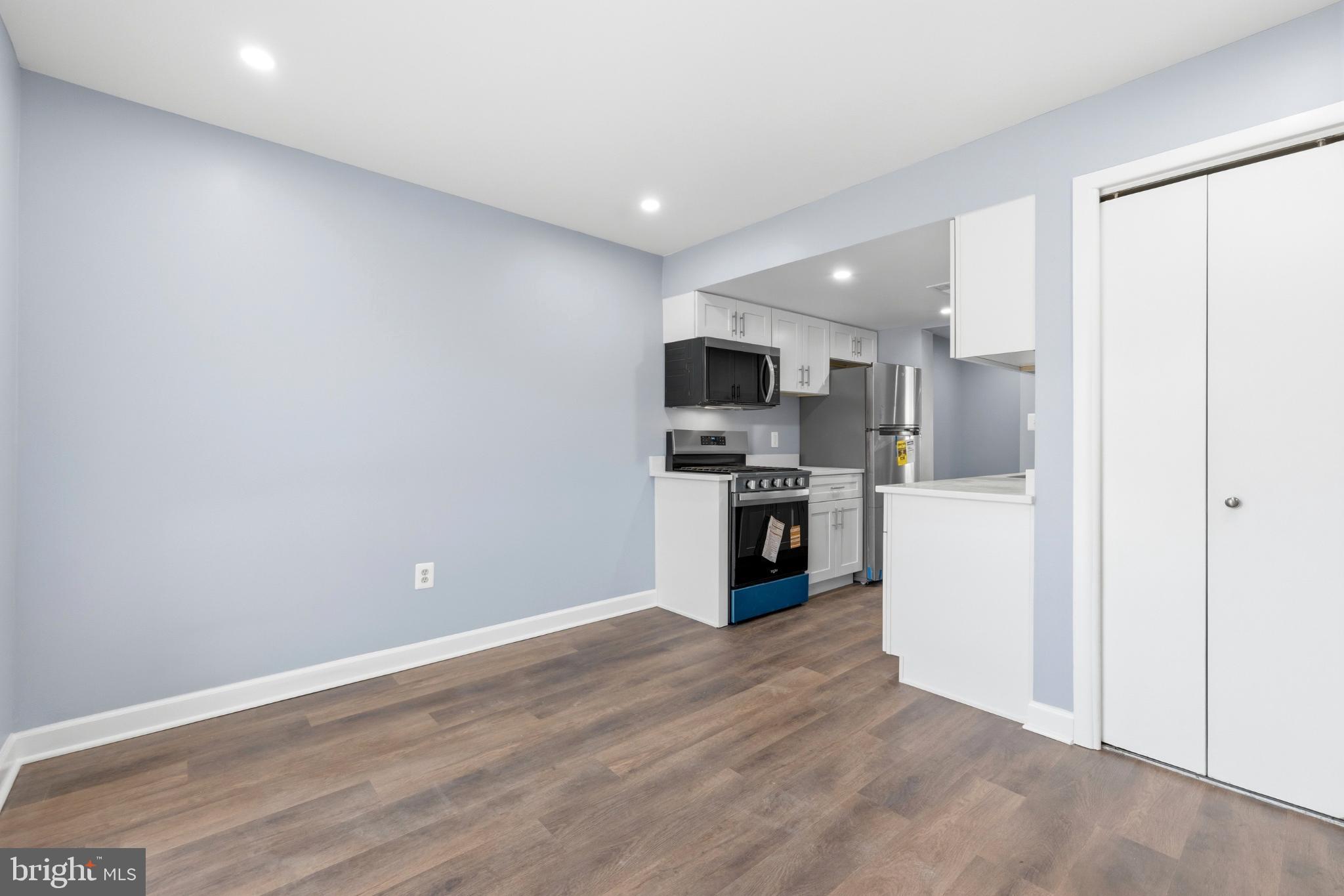 14400 Gunstock Court, Unit 4 Silver Spring, MD 20906 - Photo 12 of 47 Modern kitchen with sleek finishes.