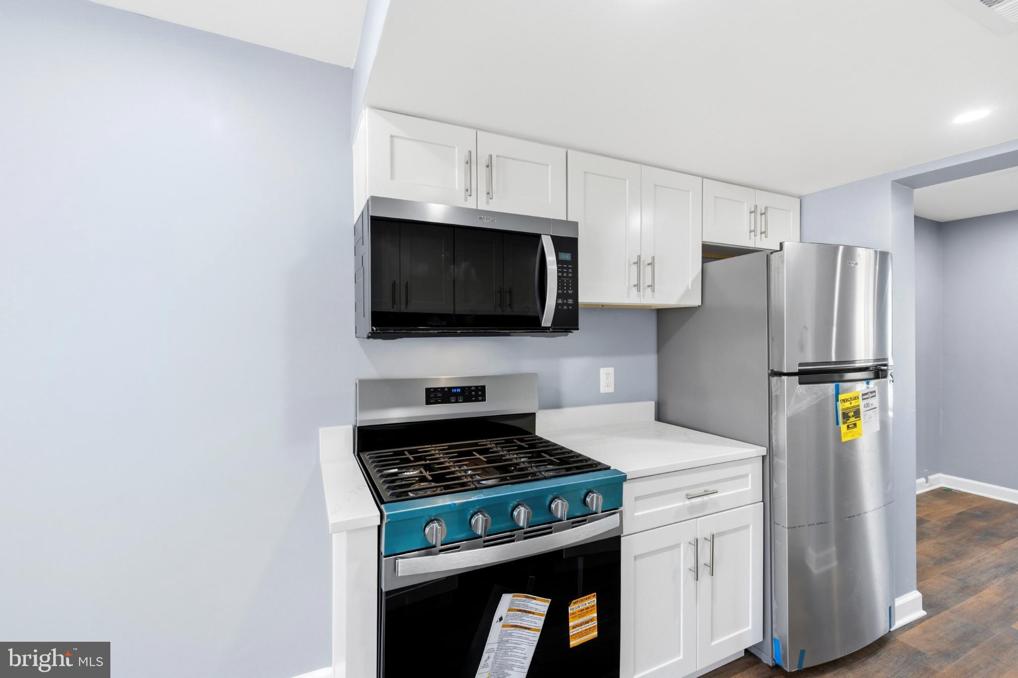 14400 Gunstock Court, Unit 4 Silver Spring, MD 20906 - Photo 13 of 47 Modern kitchen with sleek appliances.