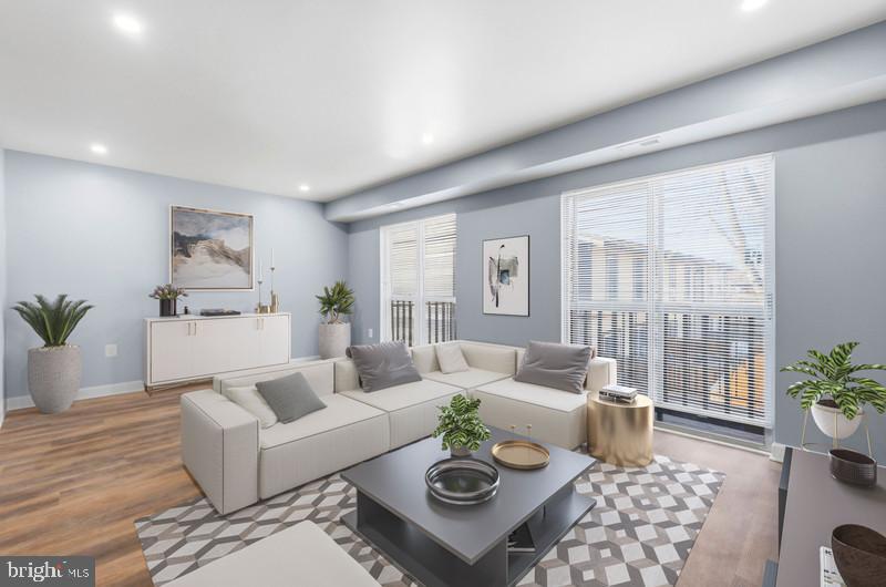 14400 Gunstock Court, Unit 4 Silver Spring, MD 20906 - Photo 3 of 47 Bright and airy living room (virtually staged)