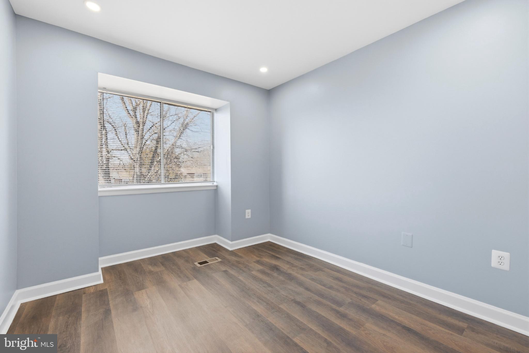 14400 Gunstock Court, Unit 4 Silver Spring, MD 20906 - Photo 31 of 47 Bright, airy room with serene blue walls.