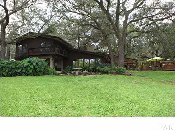 7603 Helms Road Pensacola, FL 32526 - Photo 1 of 24 One of a kind home with breathtaking views of the woods and hills of this private 32 acre estate. Deer, fox, rabbits, ducks and birds of all types frequent the property. Truly a nature's paradise, all just minutes from downtown.