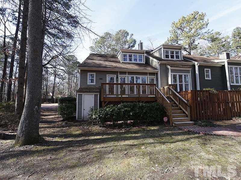 5919 Sentinel Drive Raleigh, NC 27609 - Photo 12 of 13 a view of a house with a yard