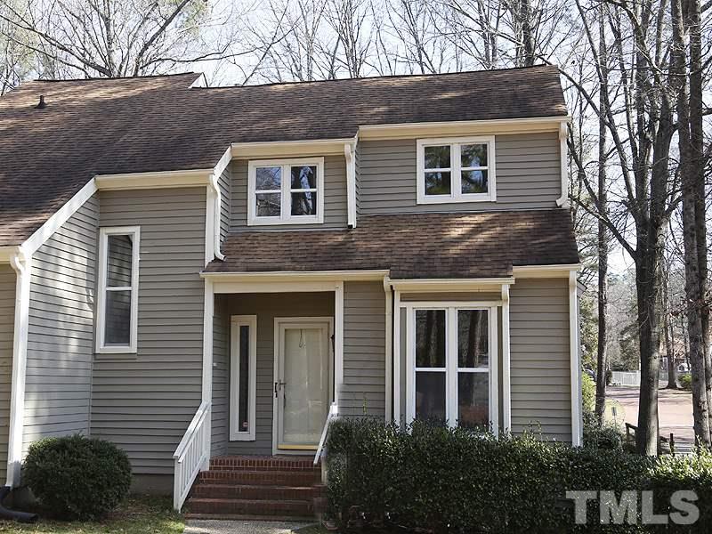 5919 Sentinel Drive Raleigh, NC 27609 - Photo 13 of 13 a front view of a house with a yard