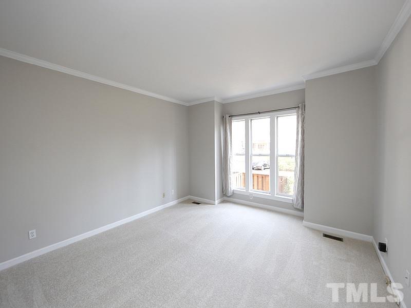 5919 Sentinel Drive Raleigh, NC 27609 - Photo 6 of 13 a view of an empty room with a window