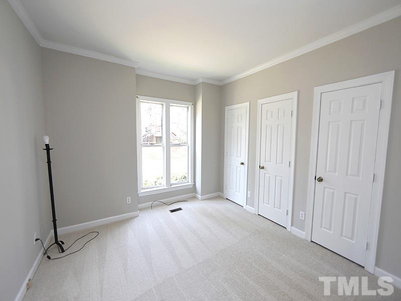 5919 Sentinel Drive Raleigh, NC 27609 - Photo 8 of 13 a view of an empty room with a window