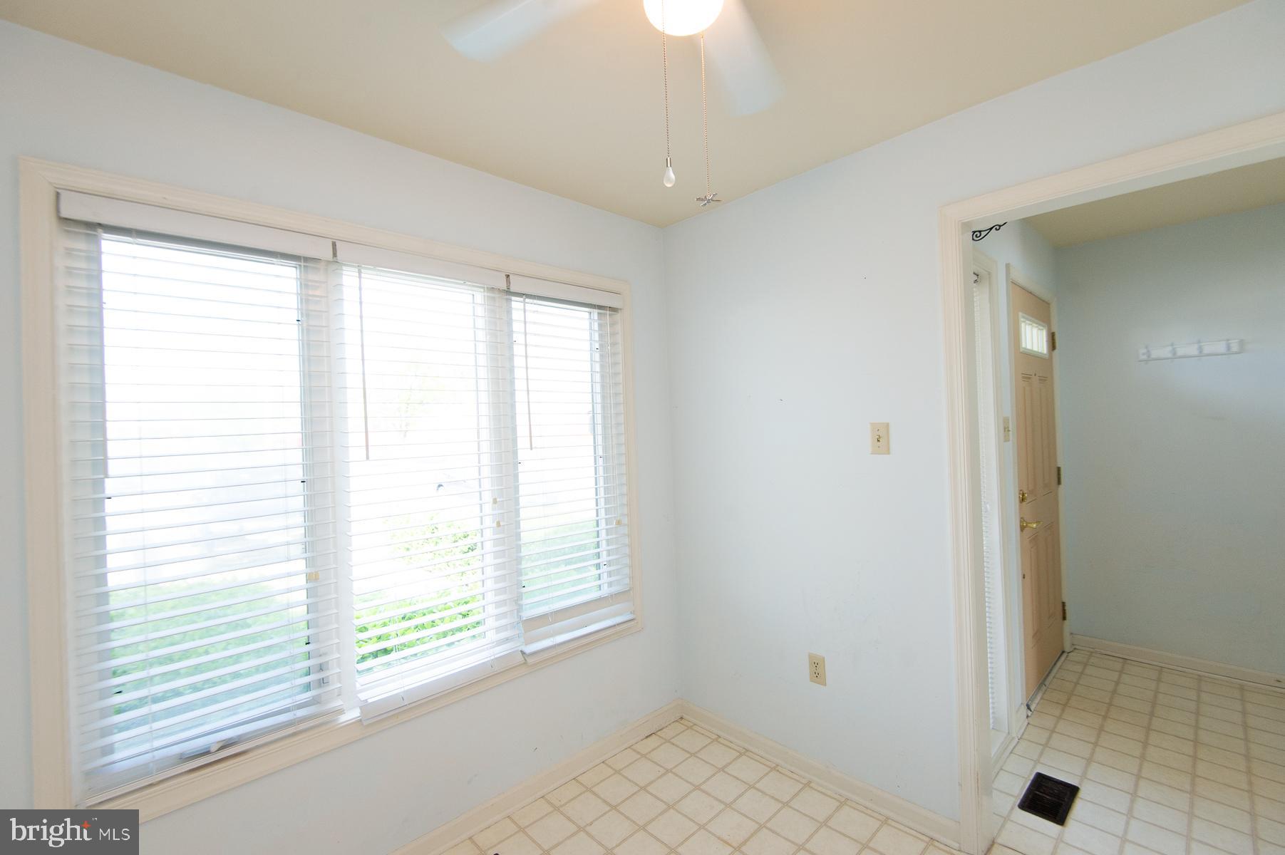 204 Market Square, Unit 12C Cambridge, MD 21613 - Photo 11 of 44 a view of an empty room with a window