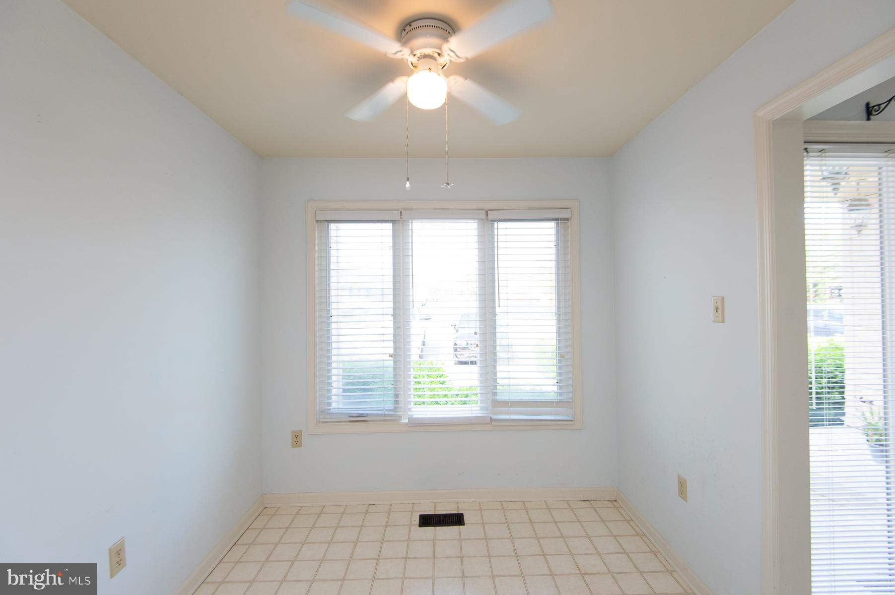 204 Market Square, Unit 12C Cambridge, MD 21613 - Photo 12 of 44 a view of an empty room with a window