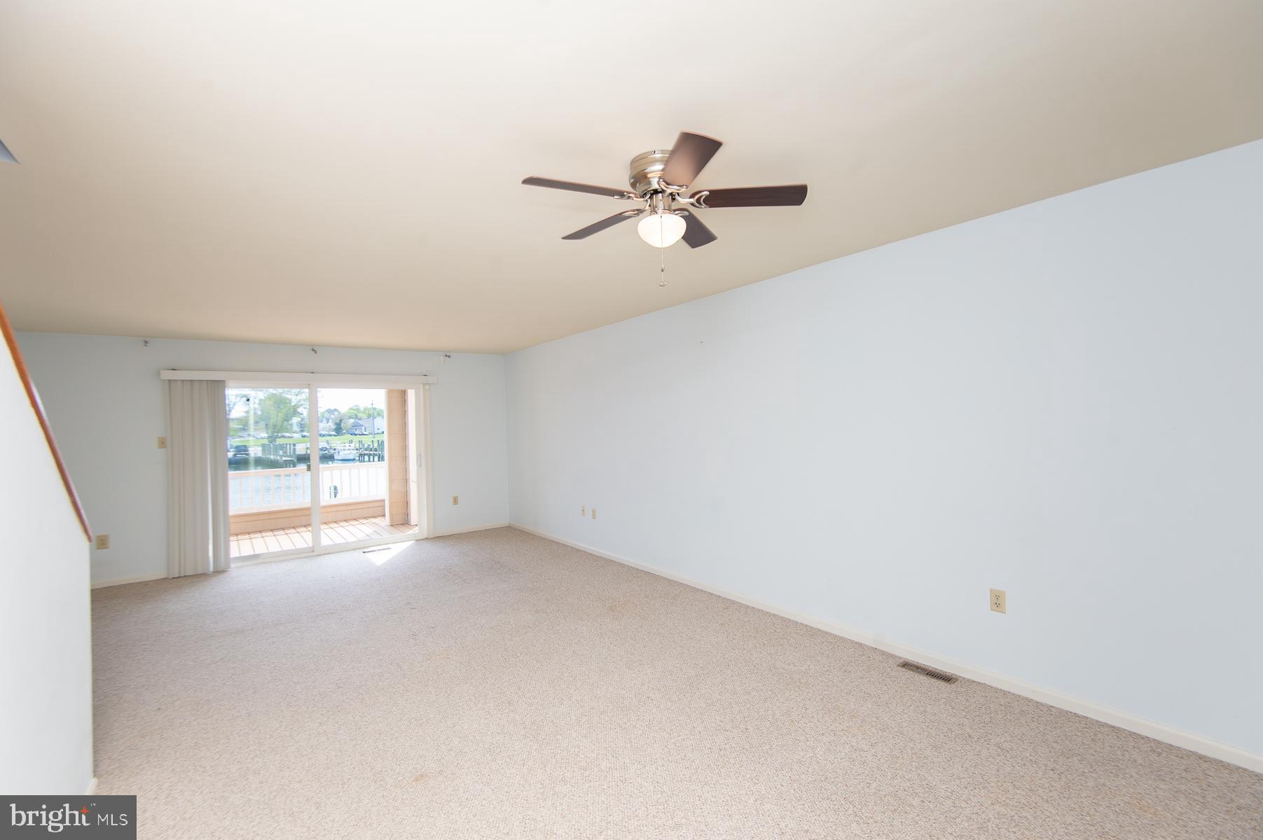 204 Market Square, Unit 12C Cambridge, MD 21613 - Photo 17 of 44 a view of empty room with window