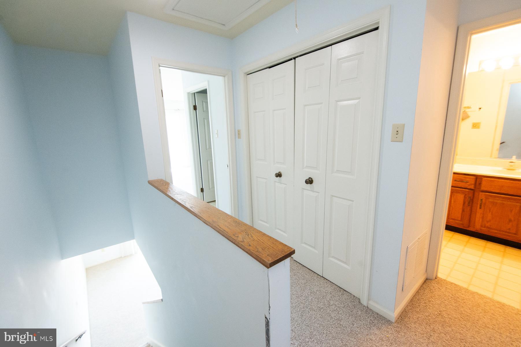 204 Market Square, Unit 12C Cambridge, MD 21613 - Photo 24 of 44 a view of a hallway with a dining room