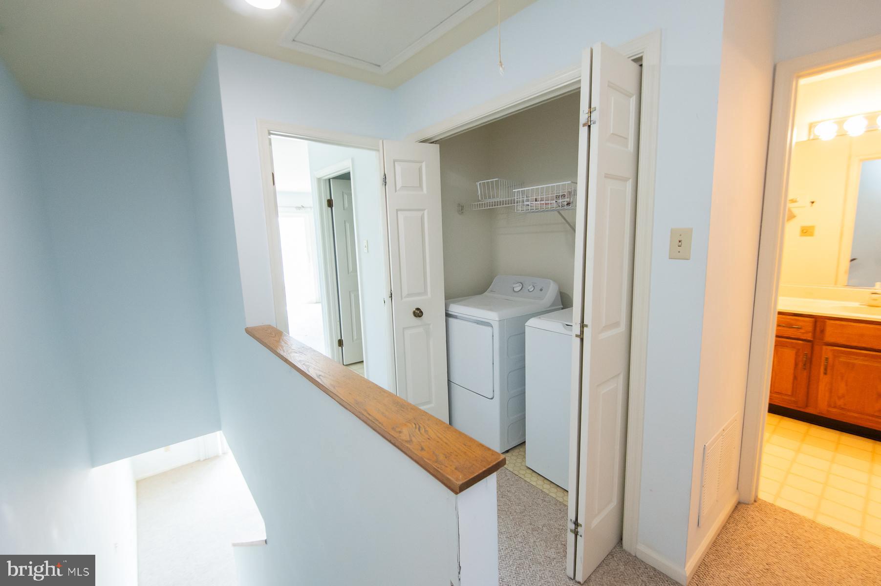 204 Market Square, Unit 12C Cambridge, MD 21613 - Photo 25 of 44 a view of hallway with bathroom