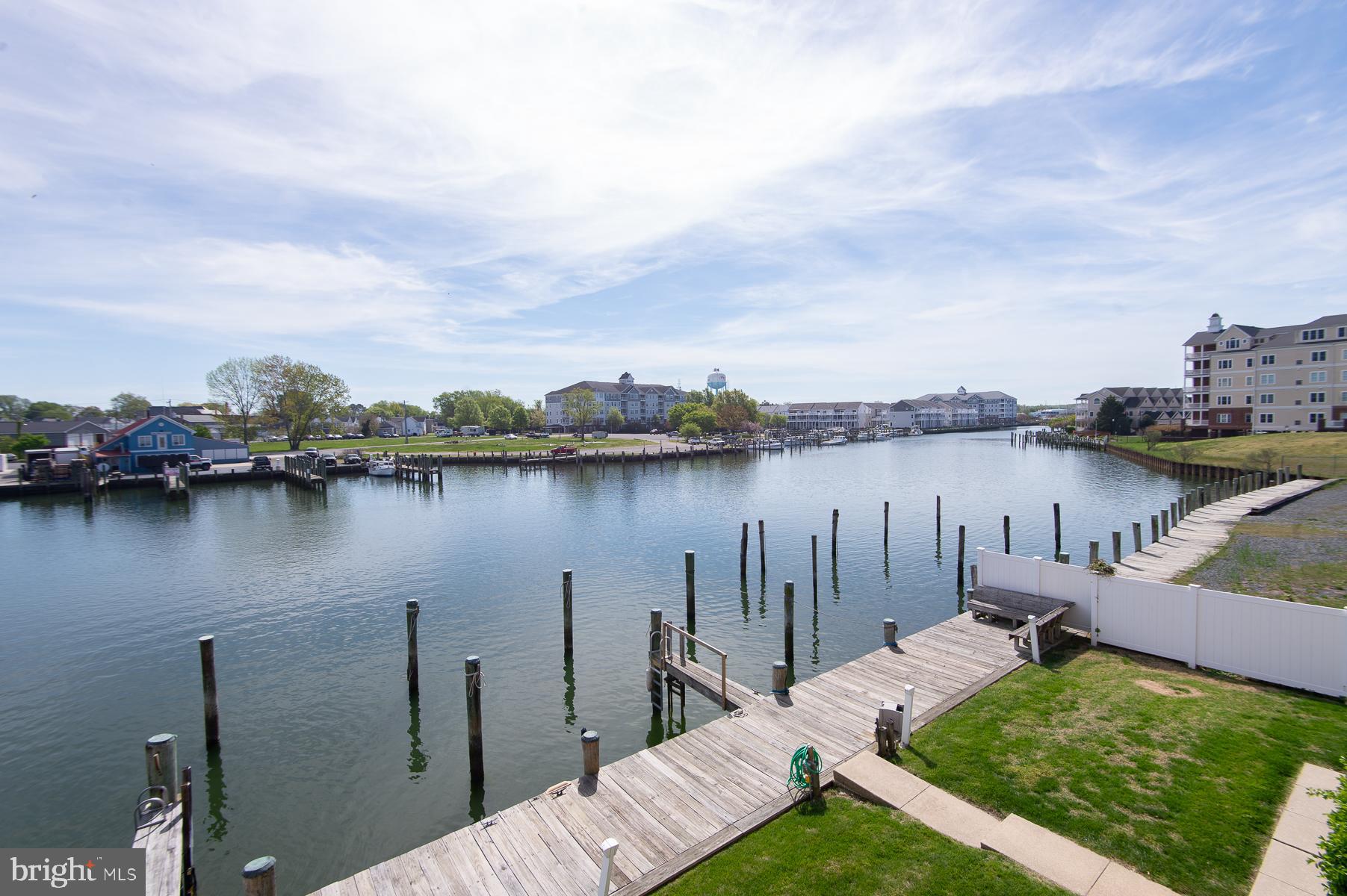 204 Market Square, Unit 12C Cambridge, MD 21613 - Photo 38 of 44 a view of a lake with houses with outdoor space