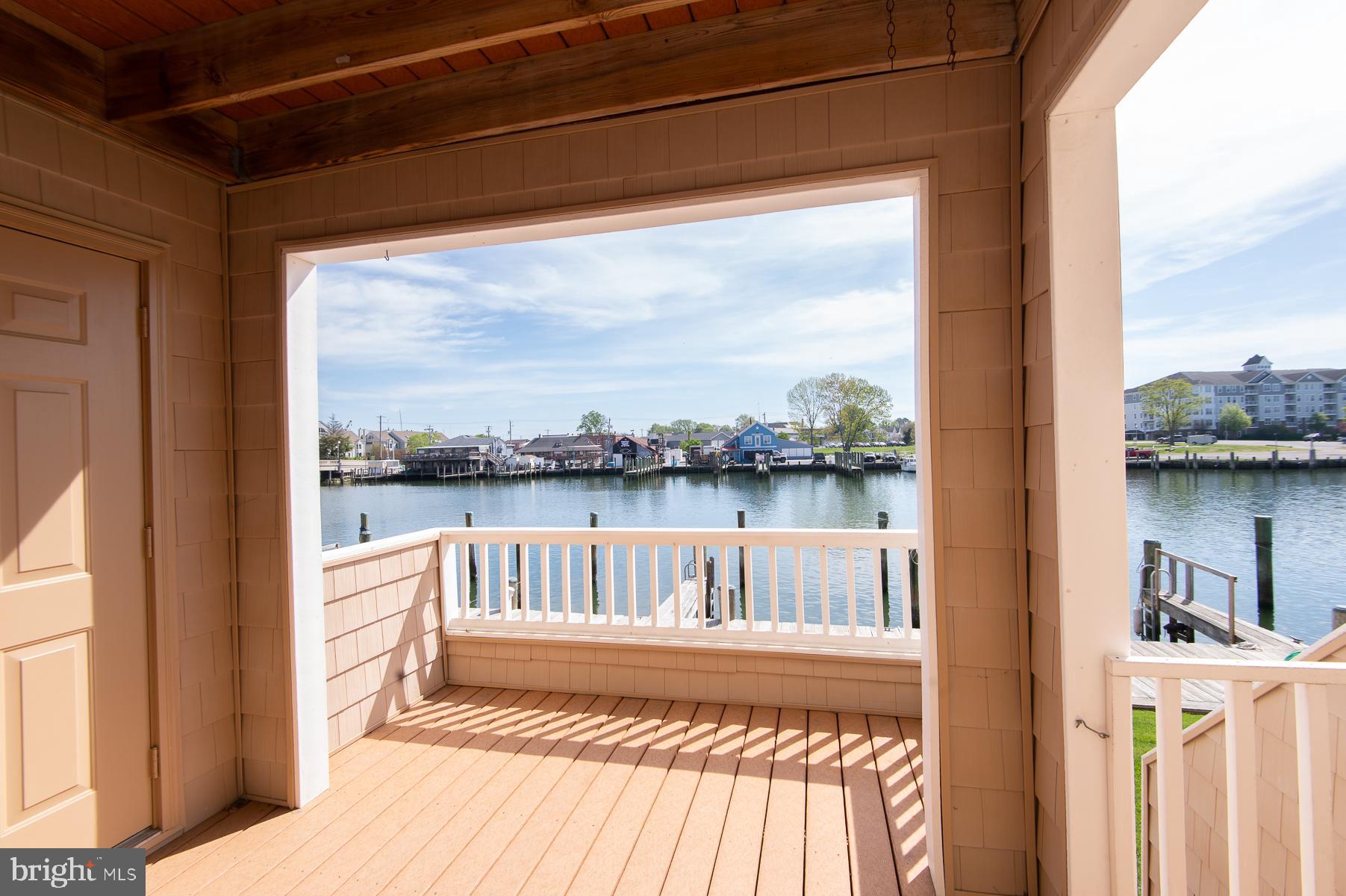204 Market Square, Unit 12C Cambridge, MD 21613 - Photo 40 of 44 a view of a balcony with lake view