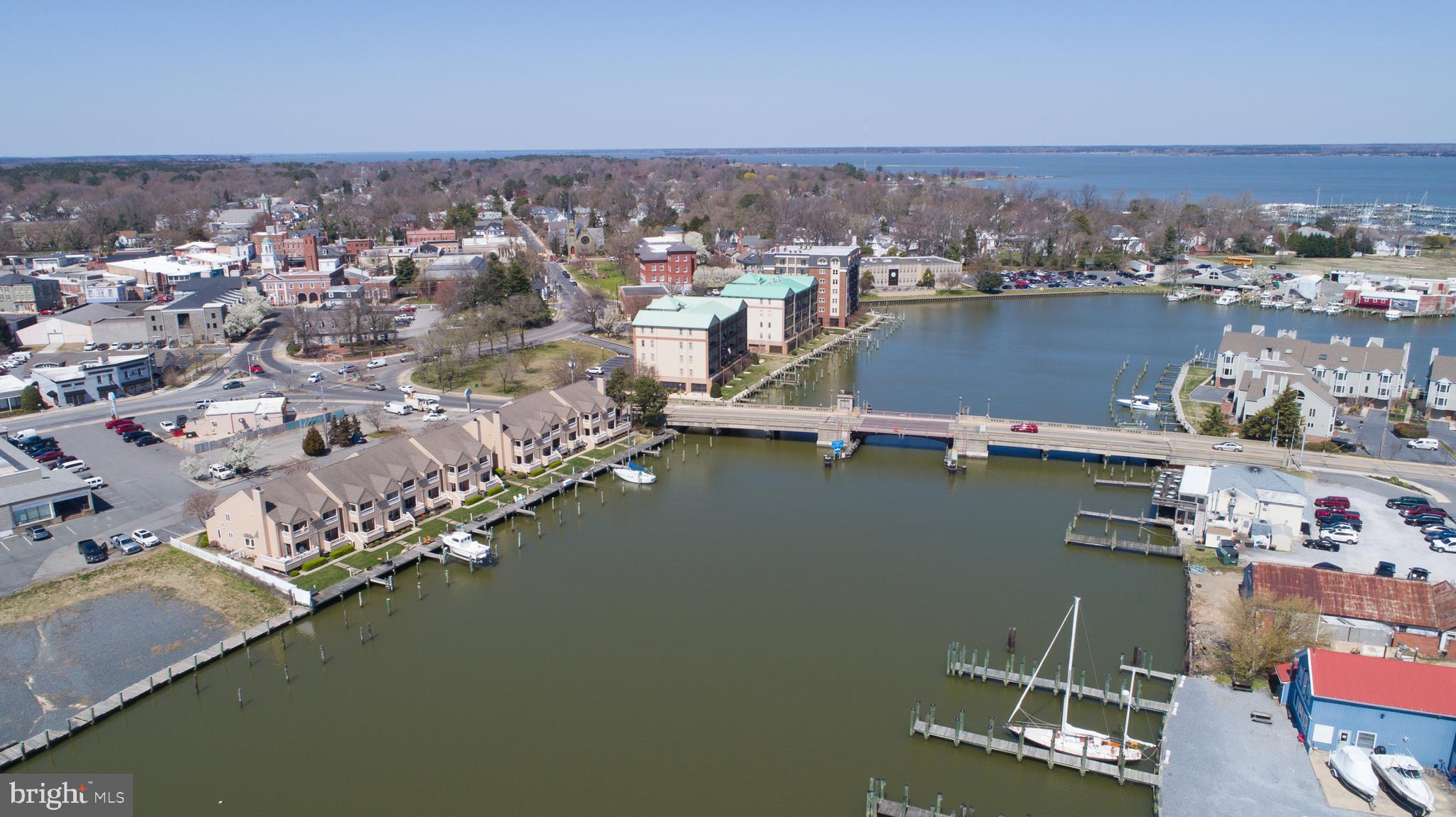 204 Market Square, Unit 12C Cambridge, MD 21613 - Photo 4 of 44 an aerial view of a city with houses
