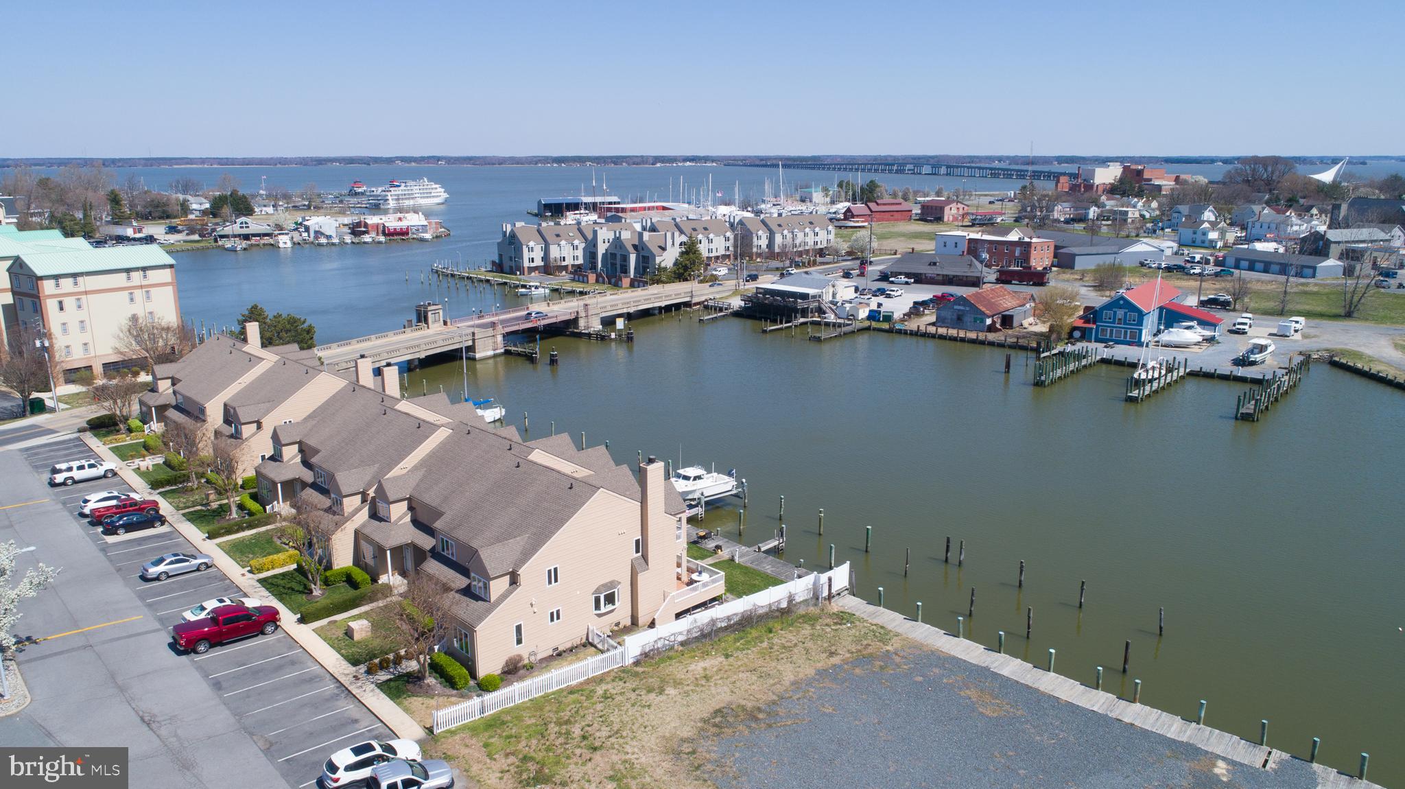 204 Market Square, Unit 12C Cambridge, MD 21613 - Photo 5 of 44 an aerial view of a house with a lake view