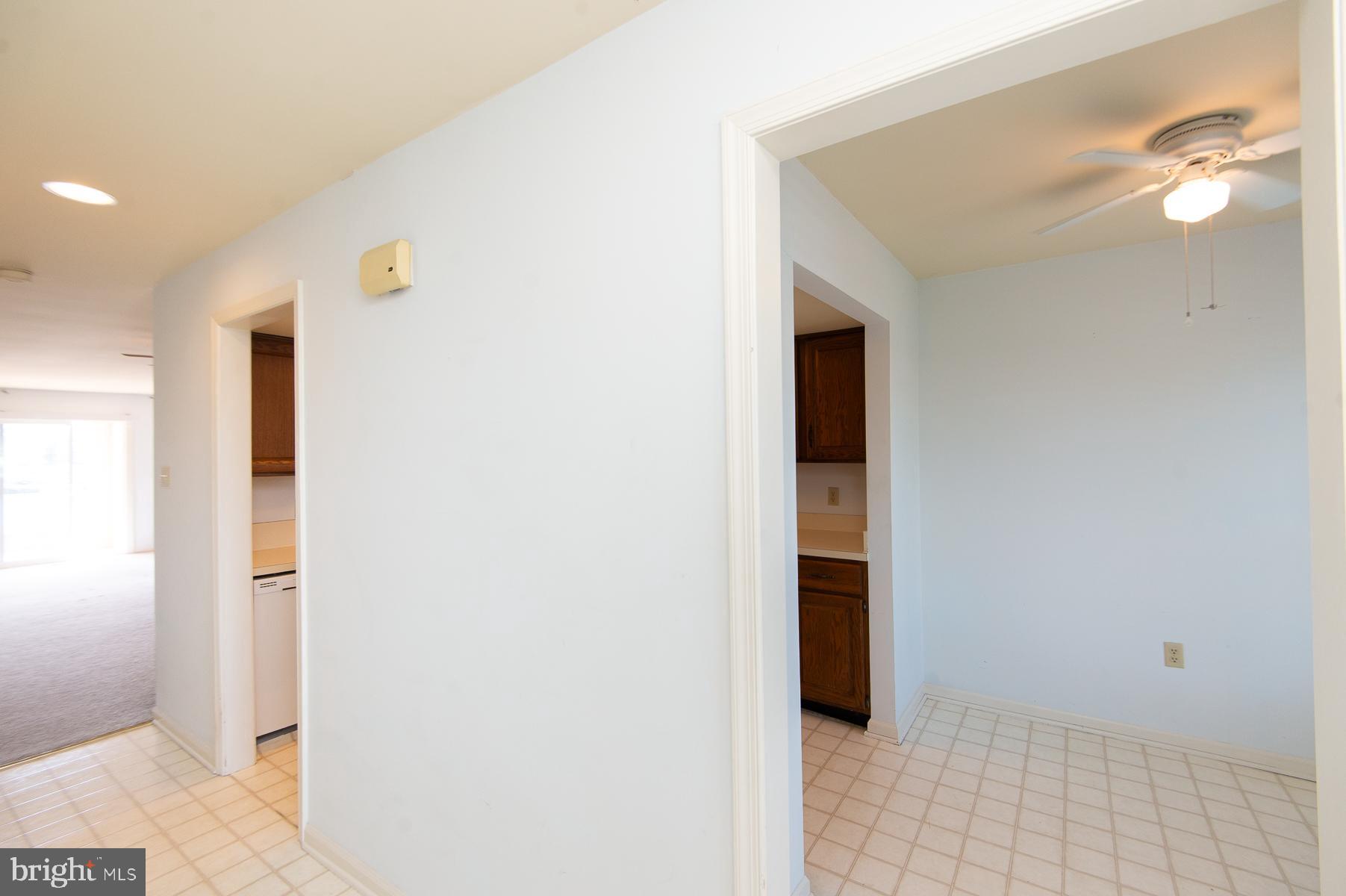 204 Market Square, Unit 12C Cambridge, MD 21613 - Photo 7 of 44 a view of a hallway with closet