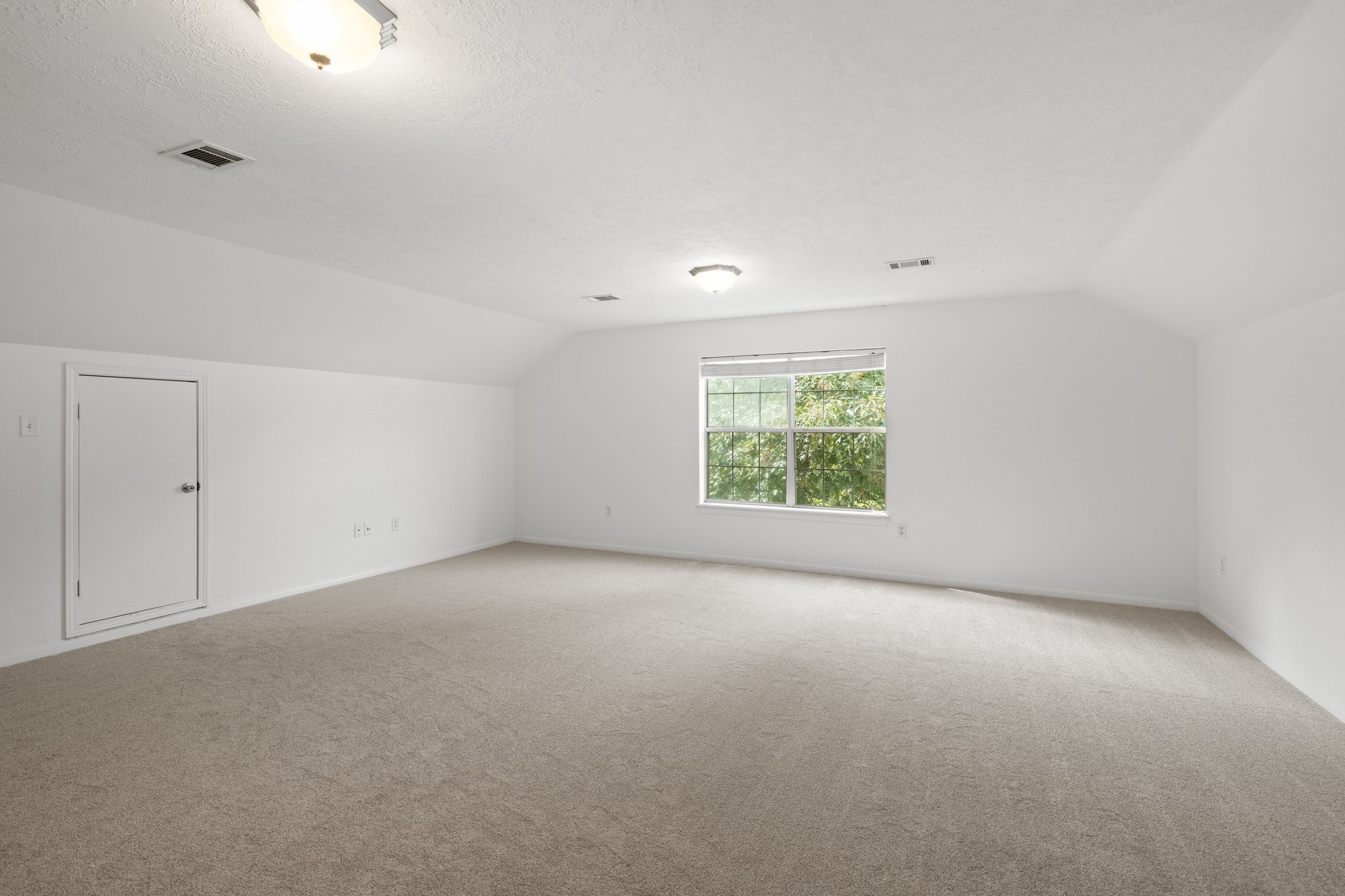 34310 High Point Drive Magnolia, TX 77355 - Photo 21 of 48 This versatile upstairs room offers endless possibilities—ideal as an extra bedroom, game room, or workout space to suit your family's needs.