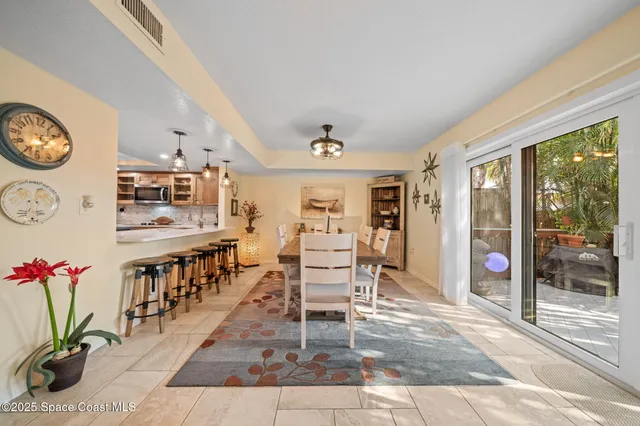 a balcony view with outdoor seating