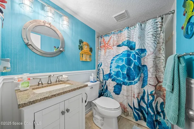 a bedroom with bed and window