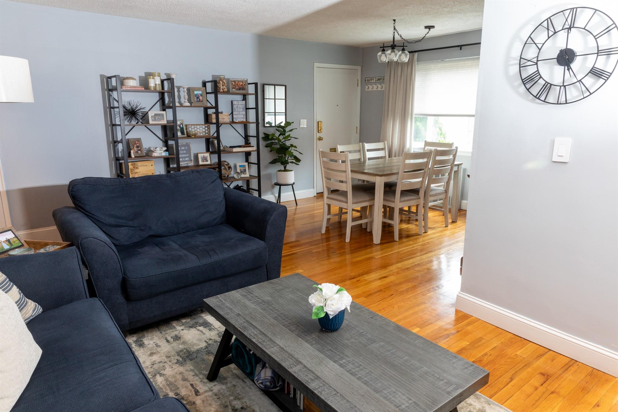 304 Fenimore Road, Unit 7A Mamaroneck, NY 10543 - Photo 1 of 10 a living room with furniture and wooden floor