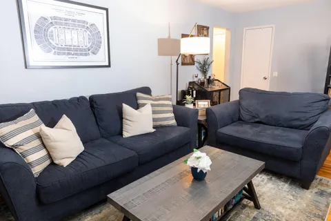 a living room with furniture and a couch