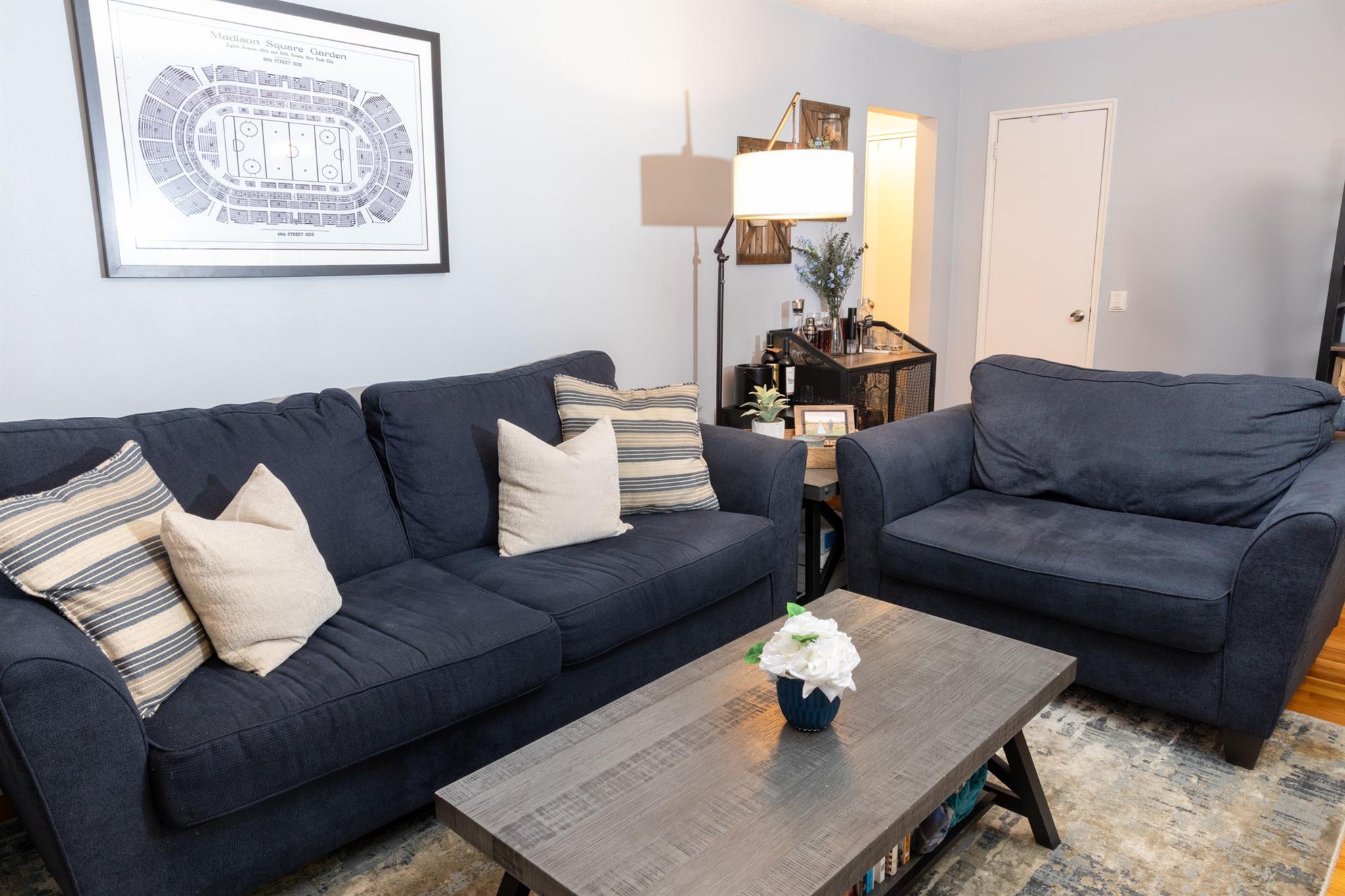 304 Fenimore Road, Unit 7A Mamaroneck, NY 10543 - Photo 2 of 10 a living room with furniture and a couch