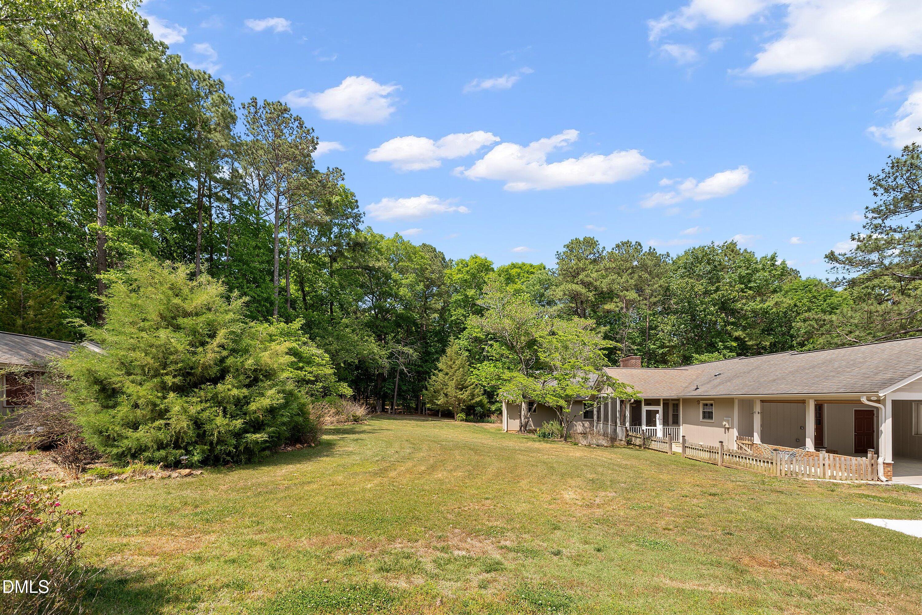 8133 Holly Forest Road Wake Forest, NC 27587 - Photo 49 of 50 a view of a house with a yard