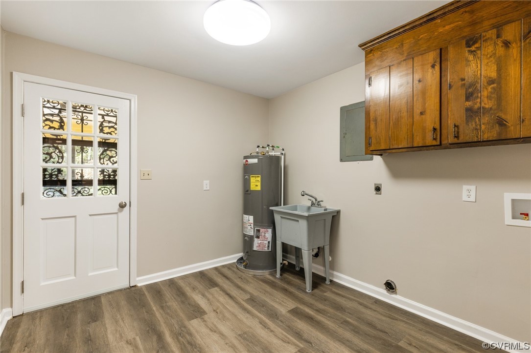 4807 Olgers Road Sutherland, VA 23885 - Photo 14 of 25 a view of a hallway with wooden floor and cabinet