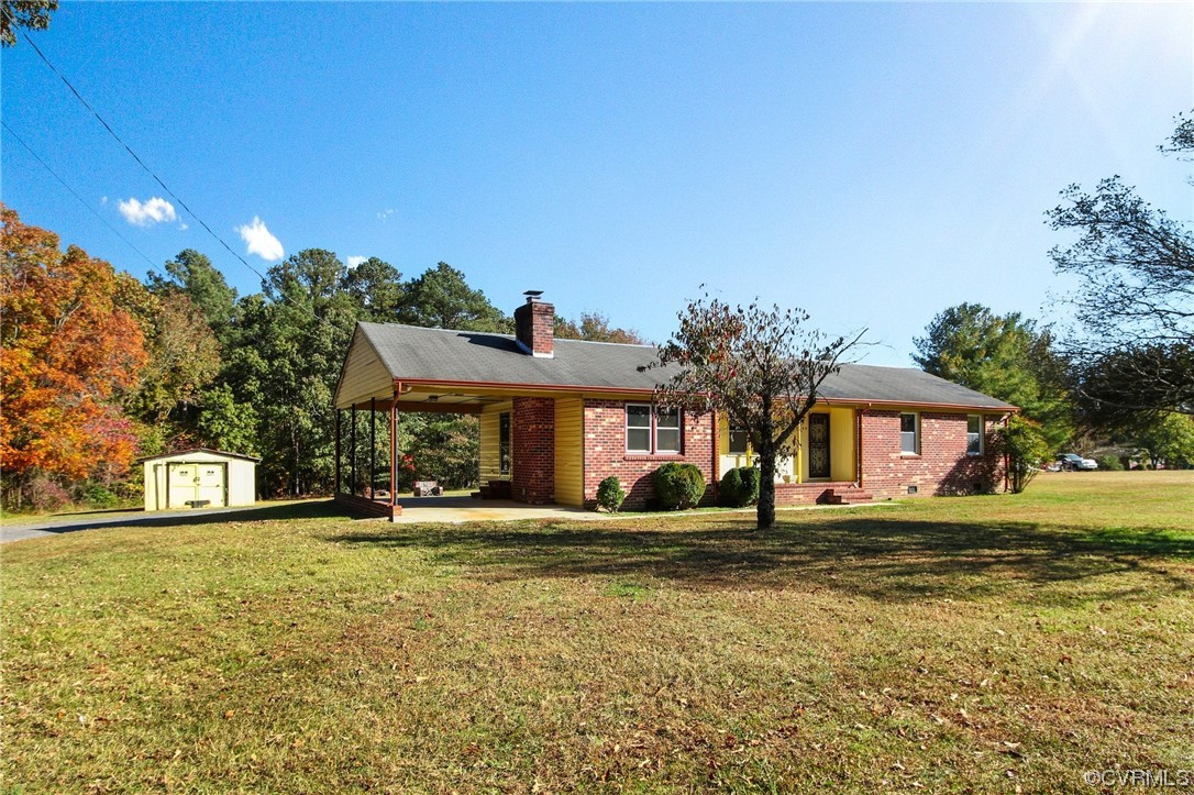 4807 Olgers Road Sutherland, VA 23885 - Photo 2 of 25 a house view with a garden space