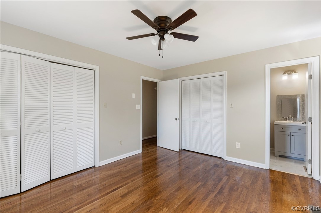 4807 Olgers Road Sutherland, VA 23885 - Photo 22 of 25 an empty room with wooden floor and a ceiling fan