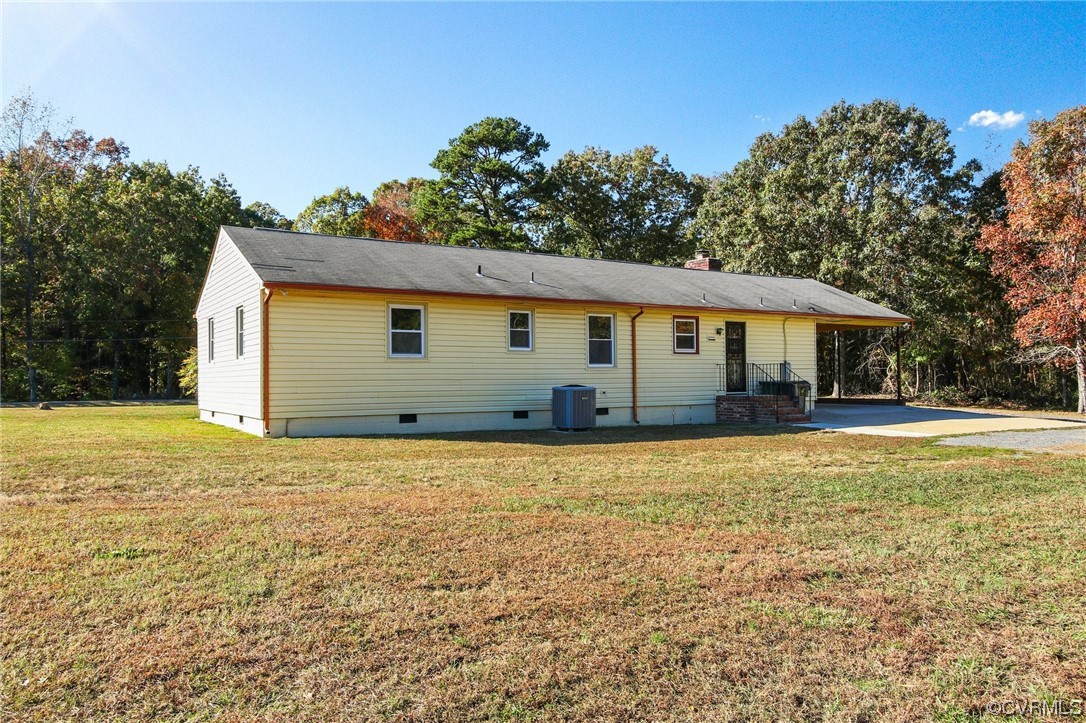 4807 Olgers Road Sutherland, VA 23885 - Photo 24 of 25 a house with yard in front of it