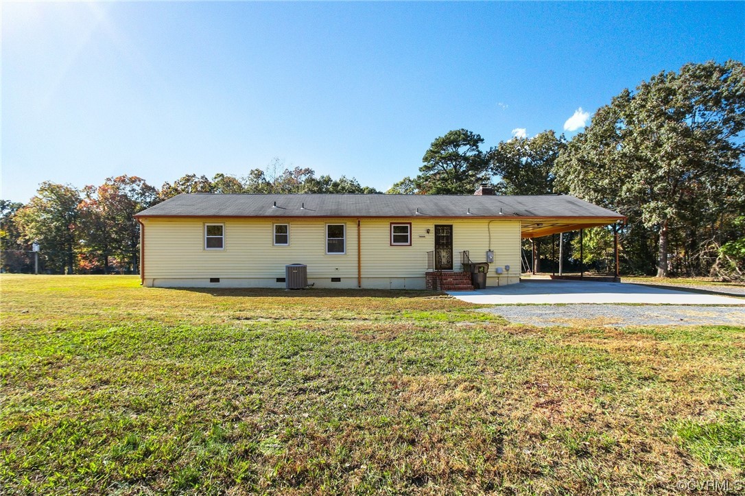 4807 Olgers Road Sutherland, VA 23885 - Photo 25 of 25 a view of house with backyard and outdoor seating