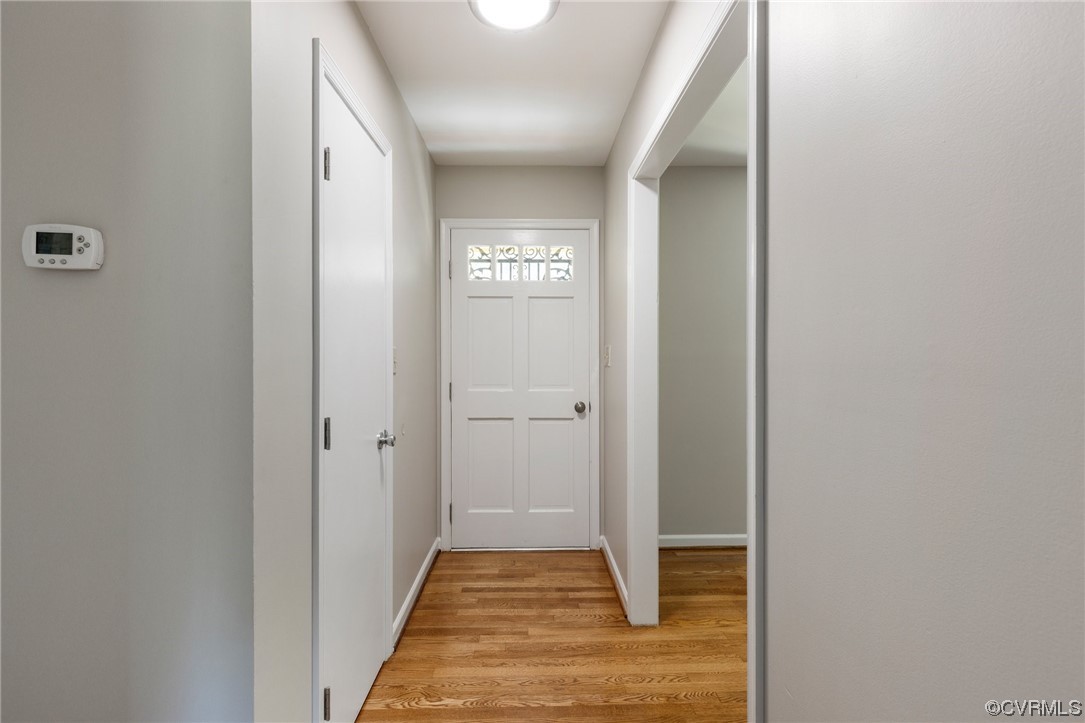 4807 Olgers Road Sutherland, VA 23885 - Photo 4 of 25 a view of hallway with wooden floor