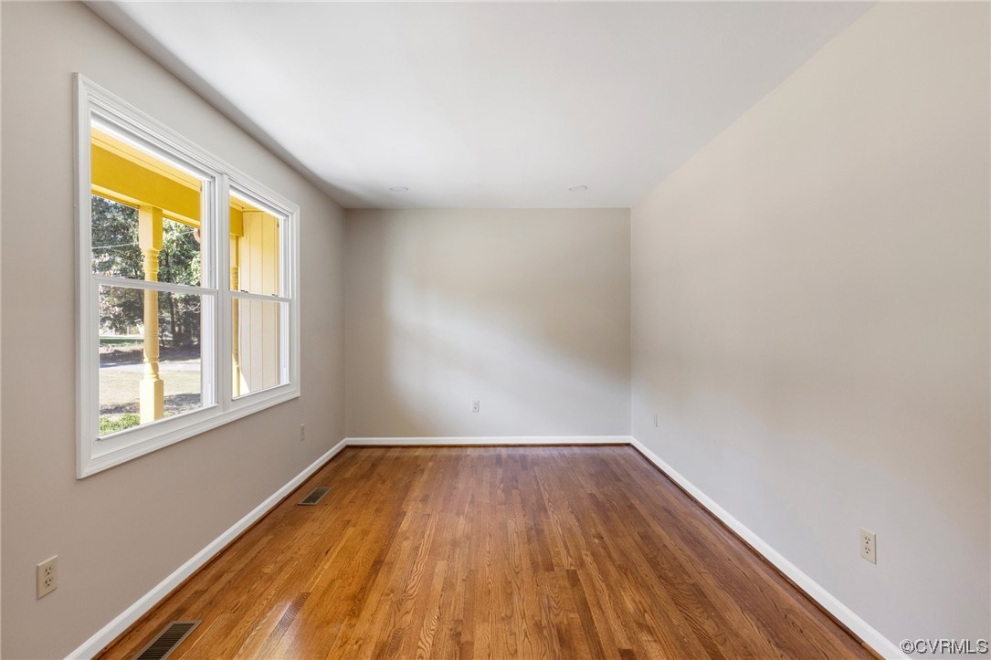 4807 Olgers Road Sutherland, VA 23885 - Photo 5 of 25 a view of a room with wooden floor and fan