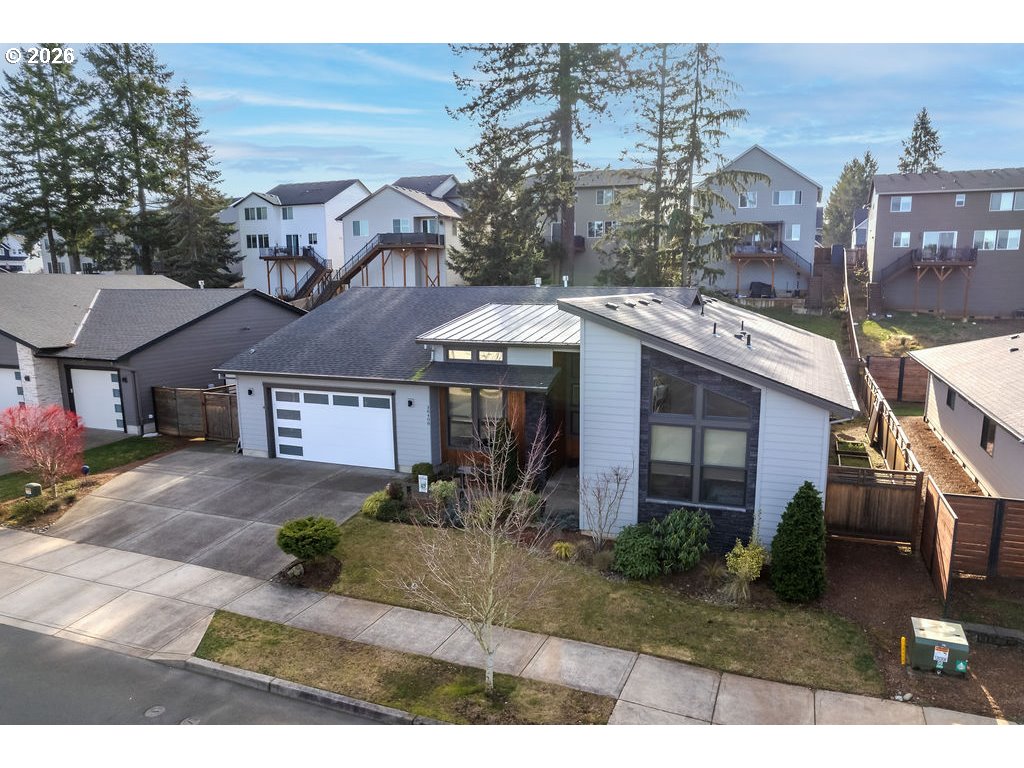 38408 Juniper Street Sandy, OR 97055 - Photo 2 of 47 a front view of a house with a yard