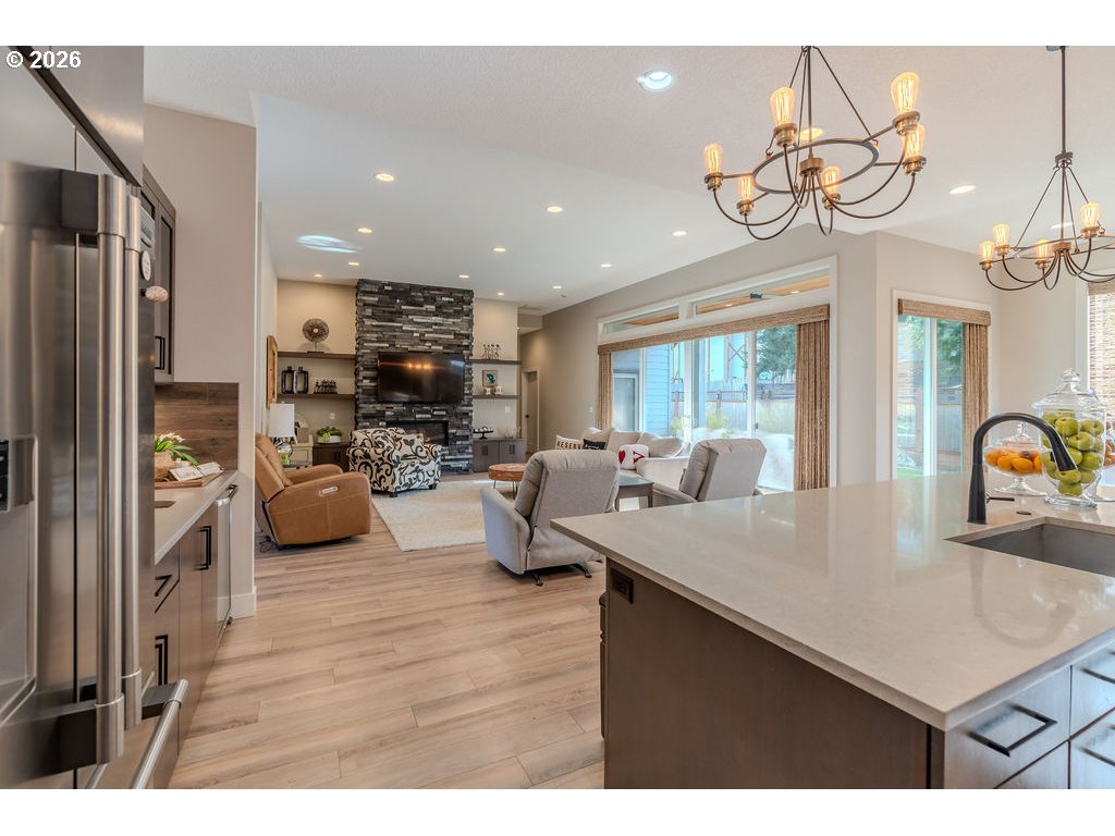 38408 Juniper Street Sandy, OR 97055 - Photo 26 of 47 a kitchen with sink refrigerator and cabinets