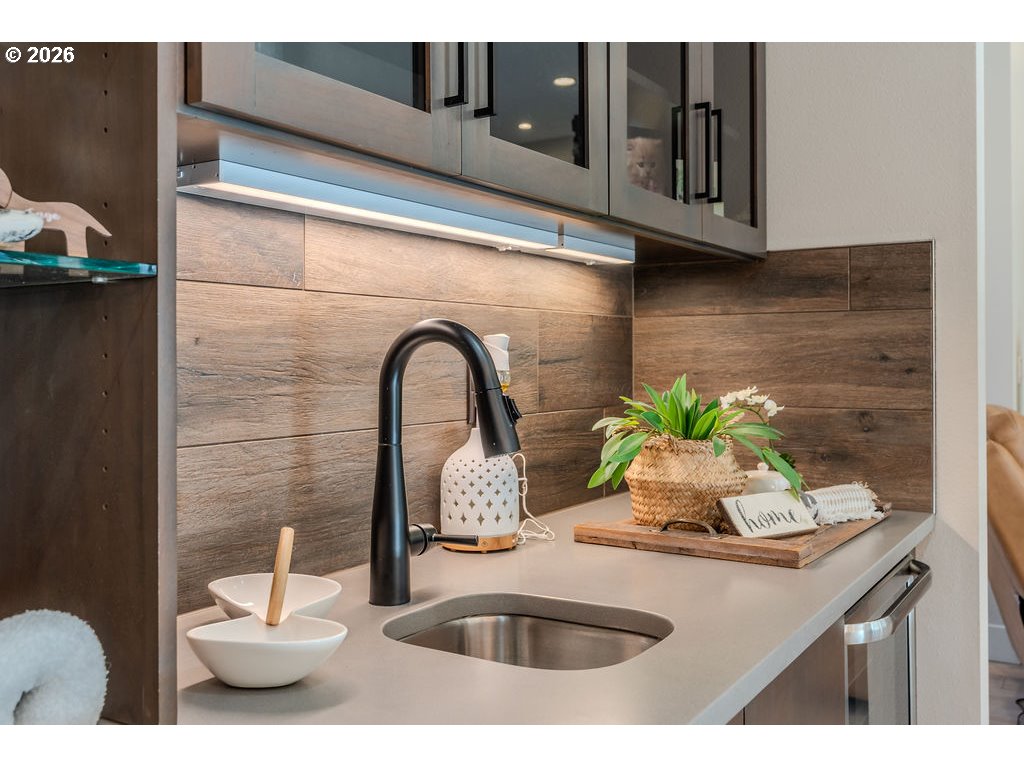 38408 Juniper Street Sandy, OR 97055 - Photo 28 of 47 a kitchen with a sink and a potted plant
